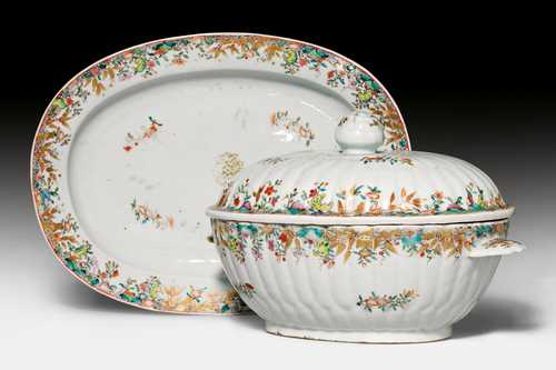A OVAL SHAPED RIBBED TUREEN AND STAND.