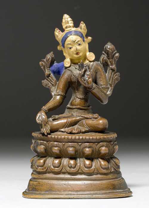 A BRONZE FIGURE OF THE WHITE TARA.