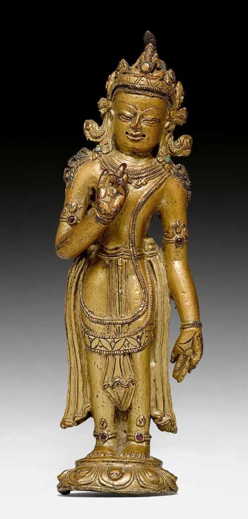 A GILT COPPER ALLOY FIGURE OF A STANDING BODHISATTVA.