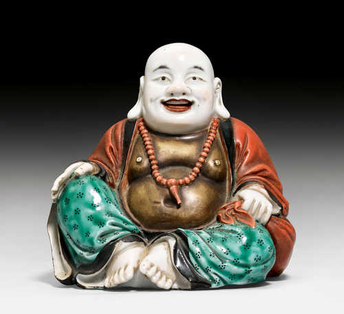 A BLANC DE CHINE FIGURE OF THE HAPPY BUDDHA (BUDAI).