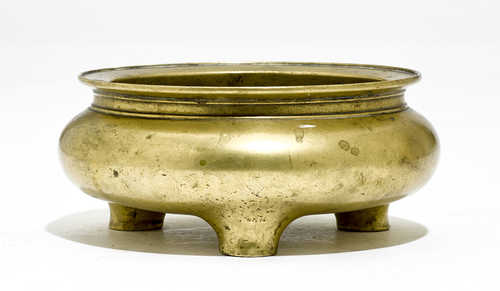 A BRASS TRIPOD CENSER.