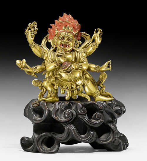 A GILT BRONZE FIGURE OF MAHAKALA.