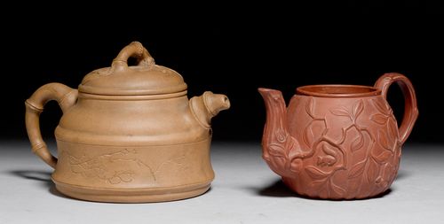 AN ENGRAVED YIXING TEAPOT WITH BAMBOO-SHAPED HANDLE AND SPOUT.