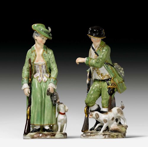 PORCELAIN FIGURES OF A HUNTRESS AND A HUNTER AS ALLEGORY OF AUTUMN,Zurich, before 1768. From a series of large figures of the seasons. The huntress with underglaze blue Z mark, the hunter with incised mark K:s. Restorations. H 21.2 and 21 cm.