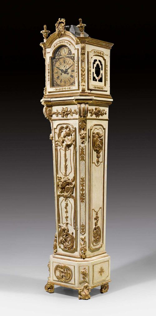 PAINTED MUSICAL CLOCK, Louis XV, the case by J. C. HOPPENHAUPT, (Johann Christian Hoppenhaupt, 1719-1785), Berlin/Potsdam circa 1760/70. Exceptionally richly carved, beige painted and parcel gilt wood. Brass chapter ring and ring for the seconds and adjustment mechanism. Verge escapement with striking on bell, triggering the harp mechanism. Requires servicing. H 268 cm. Provenance: - Formerly the collection of Prince Reuss J.L., Germany. - From a German collection.