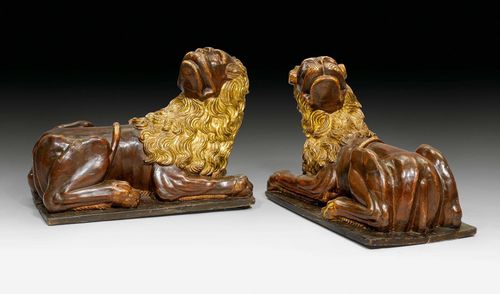 PAIR OF PAINTED LIONS,Early Baroque, Venice circa 1620/40. Dark brown painted and parcel gilt wood.  57x32x42 cm.