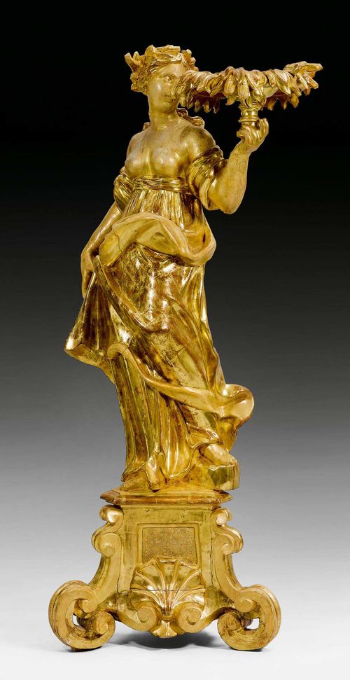 PORTE-TORCHERE,Baroque, Italy, 18th century. Richly carved giltwood. H 158 cm.