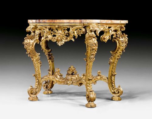 CONSOLE,Louis XV, Genoa or Rome circa 1745/55. Pierced and richly carved giltwood. "Giallo di Siena" top. 124x67x100 cm.