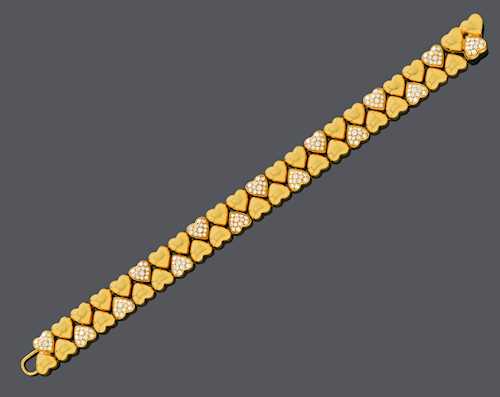 DIAMOND AND GOLD BRACELET, BY CARTIER.