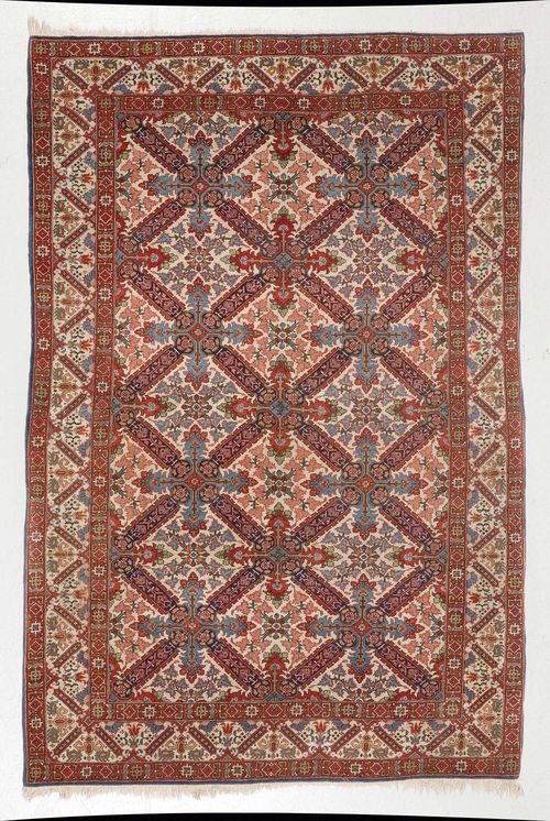 TABRIZ old.White ground, patterned throughout with St. Andrew's crosses and plant motifs, white edging, 140x216 cm.