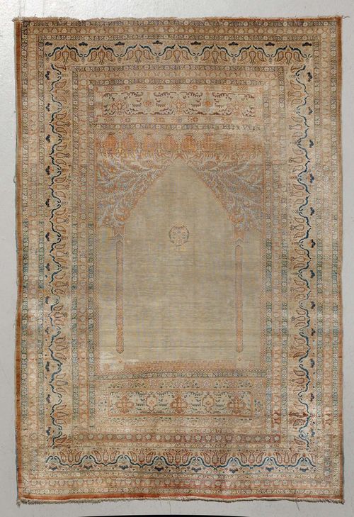 TABRIZ SILK PRAYER, antique.Light green mihrab with rust coloured spandrels, beige edging with trailing flowers, 120x170 cm.