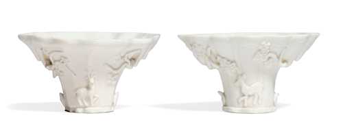 TWO RHINOCEROS HORN-SHAPED CUPS.