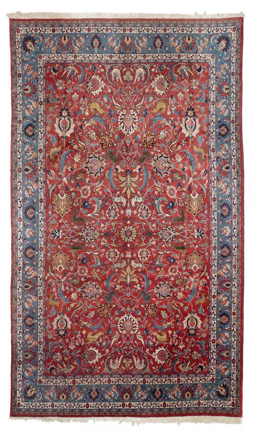 VERAMIN old.Red ground, patterned throughout with plants and animals, light blue edging, in good condition, 227x357 cm.