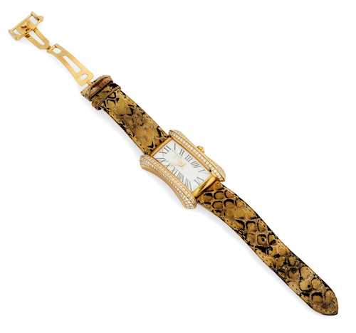 DIAMOND AND GOLD LADY'S WRIST WATCH, BY CARL E. BUCHERER.