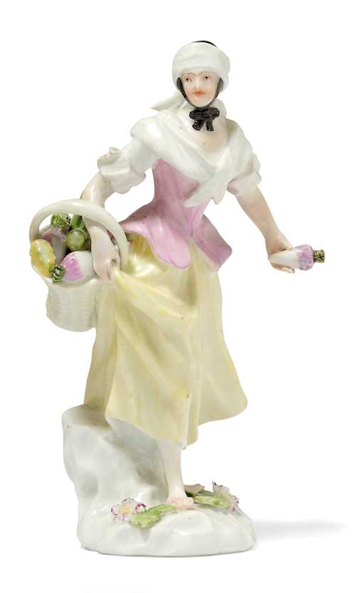 MINIATURE FIGURE OF A FEMALE VEGETABLE VENDOR