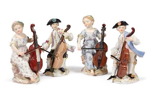 LOT COMPRISING 4 FIGURES PLAYING THE CELLO