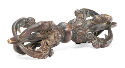 A FOUR-PRONGED BRONZE VAJRA.