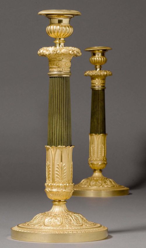 PAIR OF CANDLESTICKS,Restauration style, Paris, 19th century. Gilt and burnished bronze. H 33 cm.