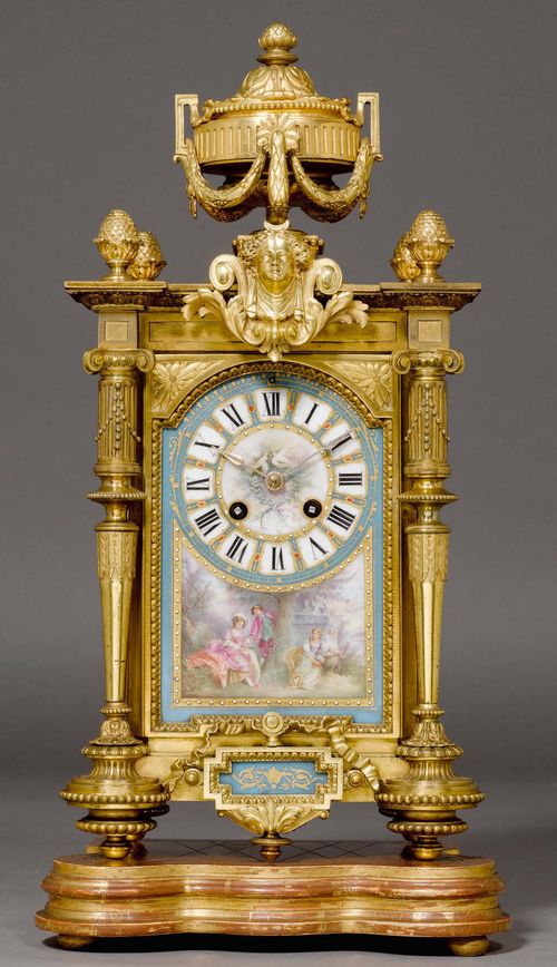 MANTEL CLOCK WITH PORCELAIN PLAQUES,Napoleon III, Paris circa 1880. Gilt bronze and "gout de Sevres" painted porcelain. The plinth with remains of gilding. The clock with porcelain dial and Paris escapement striking the 1/2 hours on bell. 21x14x42 cm. H with plinth 47 cm.