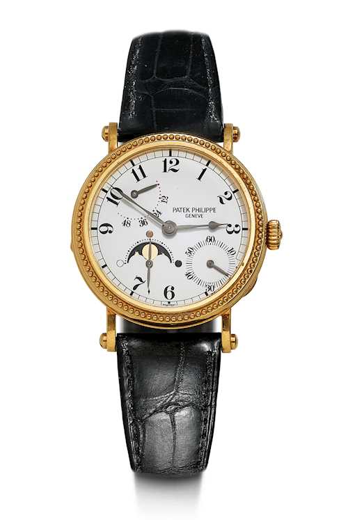 Patek Philippe, rare and attractive wristwatch with moon phase and power-reserve indicator, 1998.