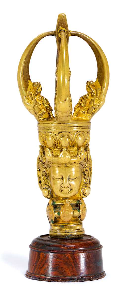 A FINE GILT BRONZE GHANTA HANDLE.