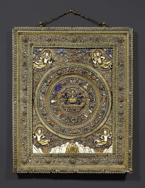 A STUNNING METAL AND SILVER THANGKA WITH STONE, BONE AND GLASS INLAYS Tibet, first half of 20th c.73x59 cm.