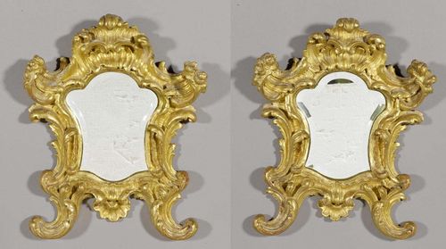 PAIR OF SMALL MIRRORS,Louis XV, Italy, 18th century. Robustly carved and gilt wood. Faceted mirror plate. H 42 cm, W 33 cm.