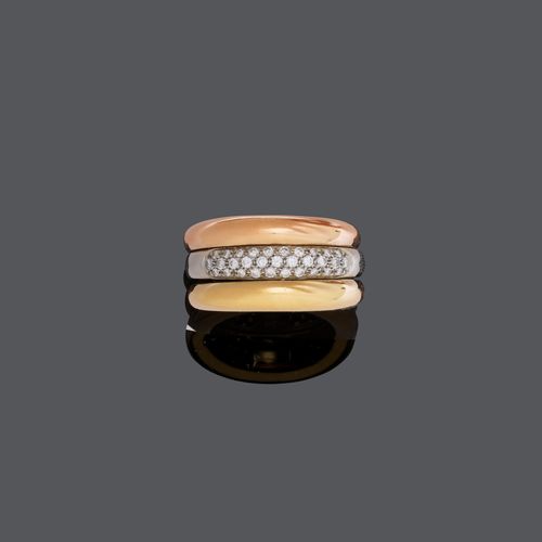 DIAMOND AND GOLD RING,  BY CARTIER.