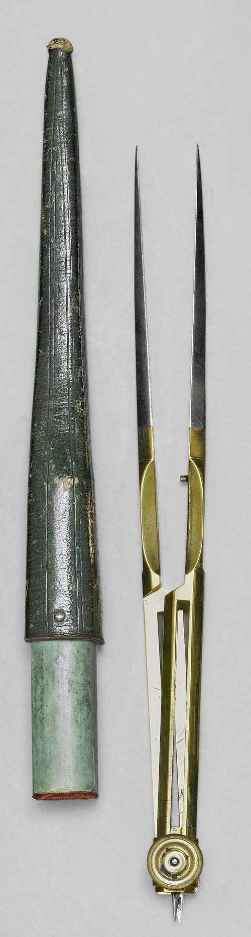 A BRASS AND STEEL PROPORTIONAL COMPASS IN GREEN LEATHER CASE, France, 19th c. L legs 20.5 cm.