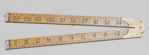 A LOT OF 2 FOLDING RULERS, England, circa 1880 resp. 1850. Boxwood, brass and ivory. Marked J. TREE MAKER...LONDON, L max 61 cm. The other marked WM COULSELL MAKER... SOUTHWARK, L max 61 cm.
