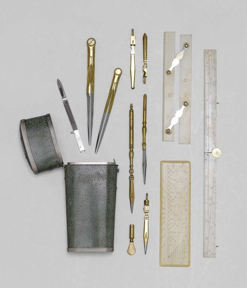 AN ENGLISH SET OF DRAWING INSTRUMENTS, circa 1790. Various instruments of brass, steel and ivory in shagreen covered case with silver mounts, L 17.5 cm.