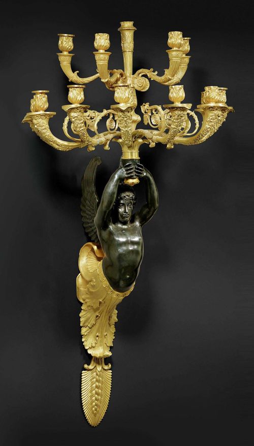 PAIR OF IMPORTANT LARGE APPLIQUES "AUX ANGELOTS",Empire style, after designs by P.P. THOMIRE (Pierre Philippe Thomire, 1751-1843), Paris. Gilt and burnished bronze. H 105 cm, W 53 cm.