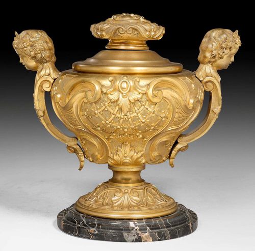 BOWL WITH HANDLE,Empire style, probably Vienna circa 1900. Gilt, relief-decorated bronze and brass with black and white/pink veined marble. H 25 cm,  28 cm.