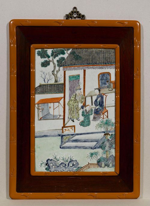 PORCELAIN PANEL.China, 19th c. 59x38.5 cm. Painted in a famille verte palette with three figures in a garden pavilion. Wooden frame added.