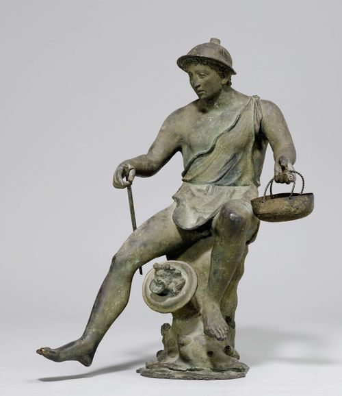 SEATED FIGURE,probably after a model from Antiquity. Patinated bronze. Boy wearing a helmet, seated on a tree stump or rock. H 52 cm.