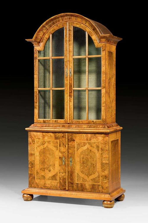 VITRINE ON CABINET,Baroque, Zurich circa 1730. Walnut, burlwood and local fruitwoods in veneer, inlaid with reserves and fillets. Bronze mounts. 107x47x221 cm.