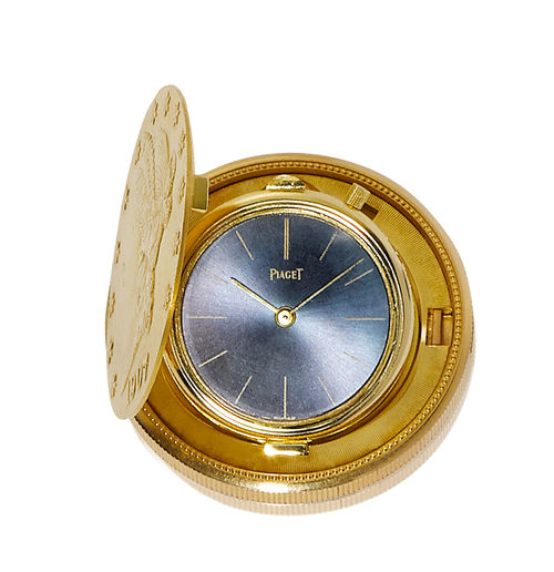 Piaget 20 dollar coin watch. Yellow gold 750