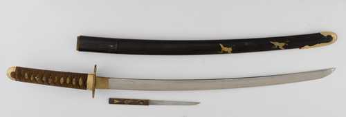 A KATANA WITH SHINOGIZUKURI-STYLE HADA AND MAKI-E CRANE DESIGN, THE KOZUKA HANDLE SHOWING AN OKINA NÔ MASK.