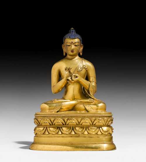 A GILT BRONZE FIGURE OF BUDDHA VAIROCANA.