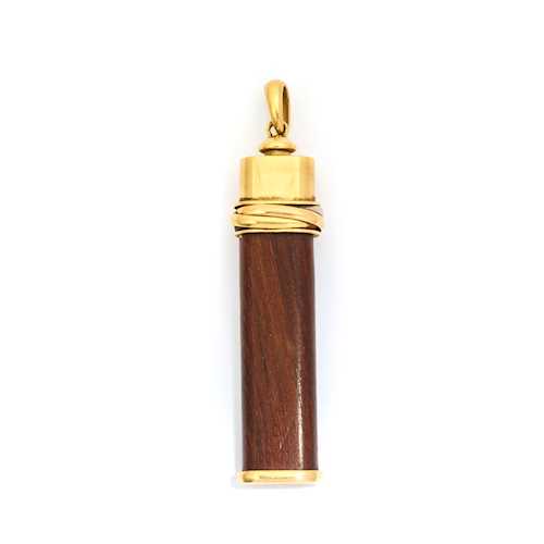 WOOD AND GOLD PENDANT BY CARTIER ca. 1980. Yellow pink and