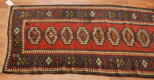 KAZAK RUNNER antique.The ends restored. 95x290 cm.