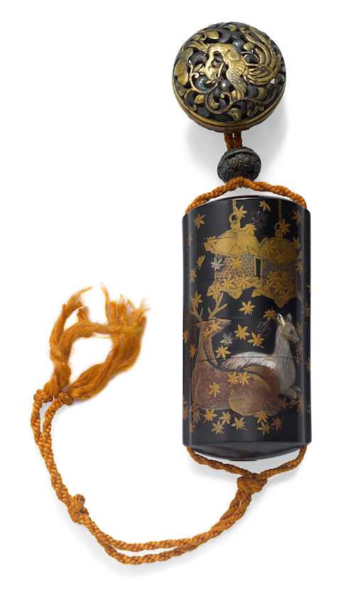 A FIVE-CASE LACQUER INRO DECORATED WITH DEER.