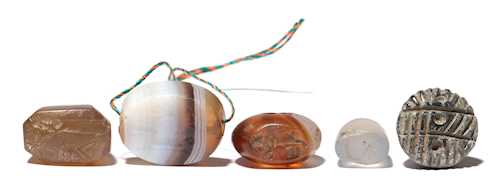 LOT COMPRISING FIVE SEAL PENDANTS