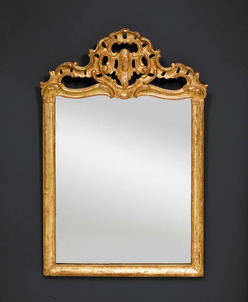 MIRROR,Louis XV, attributed to J.F. FUNK (Johann Friedrich Funk, 1706-1775), Bern circa 1775. Pierced and finely carved giltwood. H 84 cm. W 52 cm.