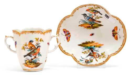 CUP AND SAUCER DECORATED WITH BIRDS