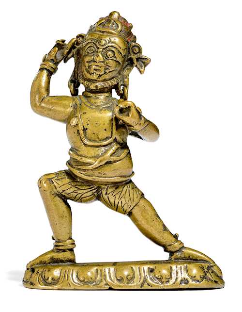 一尊小黃銅金剛手菩薩像。