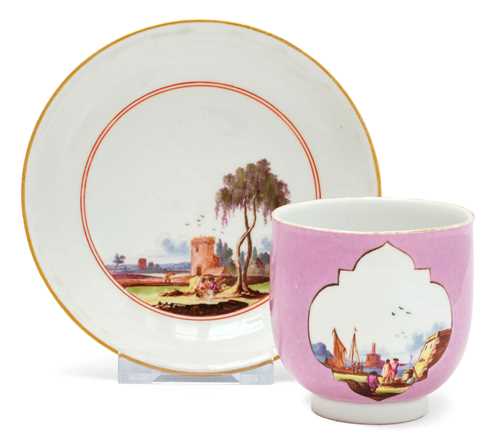 BEAKER AND SAUCER WITH A PURPLE GROUND AND LANDSCAPE DECORATION