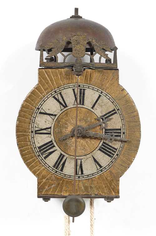 IRON CLOCK WITH FRONT PENDULUM