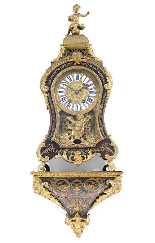SMALL BOULLE CLOCK ON PLINTH