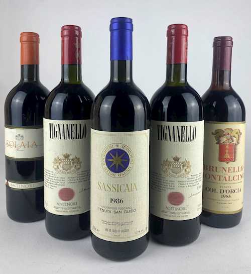 Lot of 5: 1 bt Toscana Tenuta San Guido "Sassicaia" 0.75 L 1986; 2 bts Toscana Antinori "Tignanello" 0.75 L 1986; 1 bt Toscana Antinori "Solaia" 0.75 L 1986; 1 bt Brunello di Montalcino Col d'Orcia Rosso 0.75 L 1985